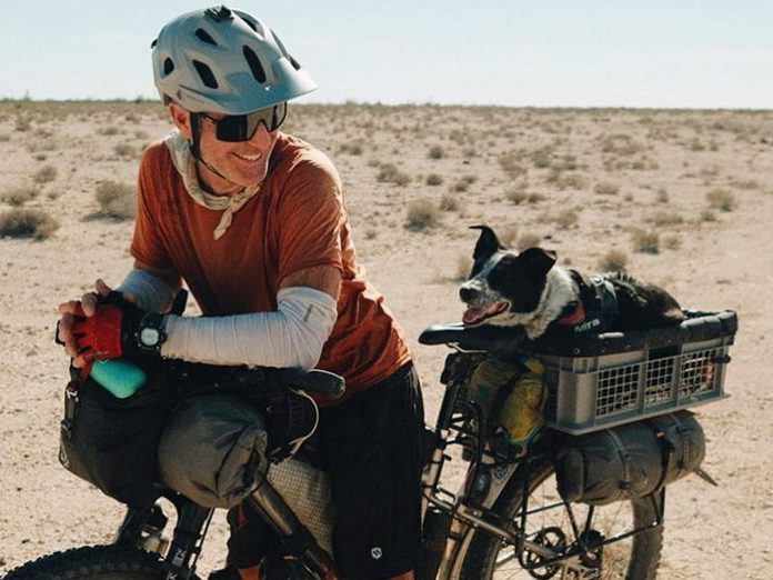 Peterborough native John Freeman, 51, and his dog Mira (known as "Mira La Perra" on social media), bike around 100 kilometres a day through all kinds of terrain and weather. Together they're planning to visit all seven continents by bike over the next six years, taking brief breaks in between trips to return home to Alberta. (Photo: John Freeman / Instagram)