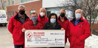 Erin Coons, CEO of the Ross Memorial Hospital Foundation, accepts a $50,000 donation from Kinsmen Club of Lindsay president Brad Fraser (second from left) and Kinsmen Don Heaslip, Doug Dent, Paul McPherson, and Rick Merrell. (Photo courtesy of Ross Memorial Hospital Foundation)
