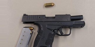 Police discovered a loaded handgun in a vehicle that crashed into a concrete barrier on on Highway 401 west in the Cobourg area on February 28, 2022. A 32-year-old Scarborough man is facing multiple firearms and other charges. (Police-supplied photo)
