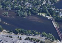 Peterborough city council has rejected a proposal to protect a corridor for a possible future two-lane bridge over the Otonabee River connecting Sherbrooke Street in downtown Peterborough to Maria Street in East City. The Eastside Transportation Study also recommended widening Maria Street to four lanes (including the swing bridge) and extending Maria Street to Television Road. (kawarthaNOW modification of Google Maps photo)