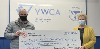 Kinsmen Club of Peterborough president Barry Croft presented a $20,000 cheque to YWCA Peterborough Haliburton executive director Kim Dolan in support of the YWCA Crossroads Shelter on March 10, 2022. (Photo supplied by YWCA Peterborough Haliburton)