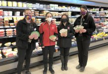 Lori Naoum and Sarah Winter (far left and far right) of Sobeys in Fenelon Falls presenting Miya Bradburn and Amy Balsdon of The Salvation Army with more than $13,000 worth of Sobeys gift cards for the local food bank. (Photo courtesy of The Salvation Army Fenelon Falls)