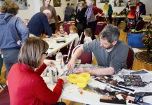 Nogojiwanong-Peterborough artist John Marris (front right) participating in a pre-pandemic community art making program. Along with artist and psychotherapist Brian Nichols, Marris has been facilitating community art making for the past three years, including for people facing marginalization and alienation. (Photo courtesy of John Marris)