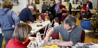 Nogojiwanong-Peterborough artist John Marris (front right) participating in a pre-pandemic community art making program. Along with artist and psychotherapist Brian Nichols, Marris has been facilitating community art making for the past three years, including for people facing marginalization and alienation. (Photo courtesy of John Marris)