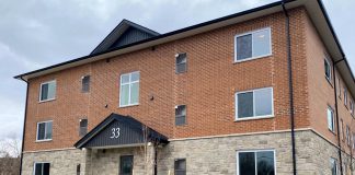 Habitat For Humanity Peterborough & Kawartha Region hosted a dedication ceremony on April 3, 2022 for its latest build: a 41-unit condominium building located at 33 Leahy's Lane in Peterborough. With six one-bedroom units, 29 two-bedroom units, and six three-bedroom units, it's the first multi-residential Habitat For Humanity development in Canada. (Photo: Paul Rellinger / kawarthaNOW)