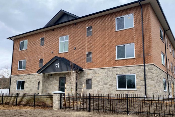 Habitat For Humanity Peterborough & Kawartha Region hosted a dedication ceremony on April 3, 2022 for its latest build: a 41-unit condominium building located at 33 Leahy's Lane in Peterborough. With six one-bedroom units, 29 two-bedroom units, and six three-bedroom units, it's the first multi-residential Habitat For Humanity development in Canada. (Photo: Paul Rellinger / kawarthaNOW) Habitat For Humanity Peterborough & Kawartha Region hosted a dedication ceremony on April 3, 2022 for its latest build: a 41-unit condominium building located at 33 Leahy's Lane in Peterborough. With six one-bedroom units, 29 two-bedroom units, and six three-bedroom units, it's the first multi-residential Habitat For Humanity development in Canada. (Photo: Paul Rellinger / kawarthaNOW)