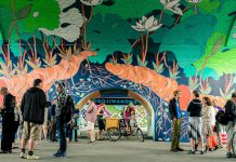 The public launch of the "Bloodroot" public art mural under the Hunter Street Bridge by Edmonton artist Jill Stanton on September 1, 2016. The Bloodroot mural is adjacent to the Nogojiwanong/Electric City mural completed in 2015 by Toronto artist Kirsten McCrea, both part of The Hunter Street Bridge Mural Project funded by the City of Peterborough's Public Art Program. For 2022, the city's Public Art Program is inviting a call for proposaals for two artist-initiated public art projects. (Photo: Samantha Moss / kawarthaNOW)