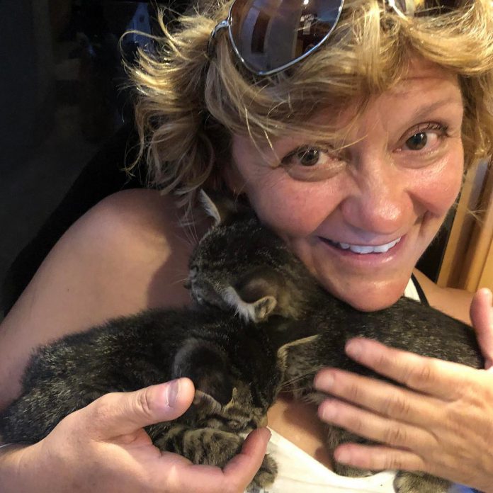 Peterborough native Chloë Black cuddles a couple of kittens. An animal lover, Chloë will be leaving her own three dogs behind so she can travel to Romania to join a group of volunteers who are caring for animals rescued from Ukraine. (Photo courtesy of Chloë Black)