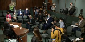 Ontario's chief medical officer of health Dr. Kieran Moore (left) at a media briefing at Queen's Park on April 11, 2022. (kawarthaNOW screenshot of CPAC video)