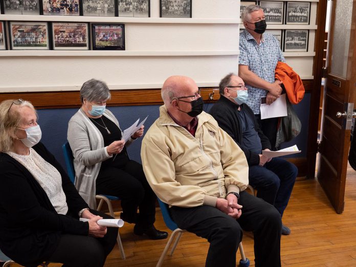 Peterborough city councillor Henry Clarke (middle), who went to King George Public School as a child, was one of the guests attending the April 14, 2022 launch event for Public Energy Performing Arts' 'Erring at King George' multidisciplinary arts festival, which runs from May 6 to 8 and 13 to 15. (Photo: Andy Carroll)