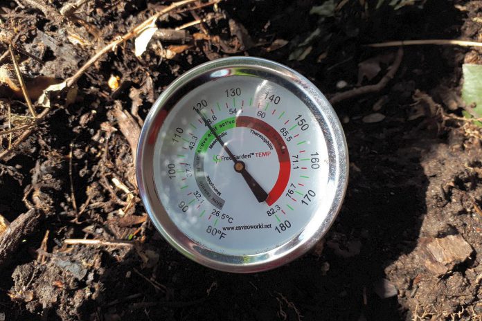 A compost pile with an internal temperature between 44 and 65 degrees Celsius tells you aerobic microorganisms are hard at work. When we send organic waste to landfills instead of composting it, the waste decomposes without the benefit of oxygen and produces the potent greenhouse gas methane. (Photo: Hayley Goodchild)