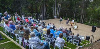 The audience at opening night at The Grove Theatre in Fenelon Falls on August 5, 2021. After a scaled-down season of concerts last year because of the pandemic, the outdoor amphitheatre will be hosting a series of live music, comedy, and theatrical events this spring will be followed by production of the spy-thriller parody 'The 39 Steps' this summer. (Photo: Fred Thornhill)