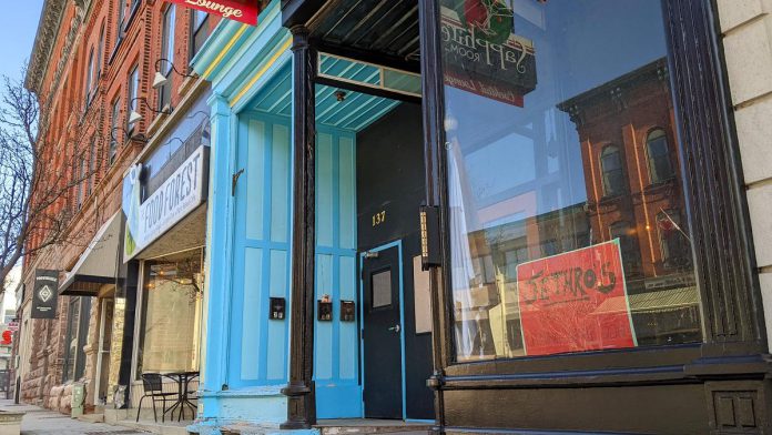 Temporary signage in the window of the new Jethro's Bar + Stage at 137 Hunter Street West in downtown Peterborough. The live music venue, in the former location of The Sapphire Room cocktail lounge, will open on April 22, 2022. (Photo: Bruce Head / kawarthaNOW)