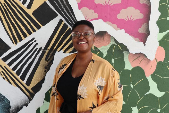Peterborough city councillor Kemi Akapo in front of artist Kirsten McCrea's Nogojiwanong/Electric City mural mural under the Hunter Street bridge. Akapo, who was elected as Town Ward councillor in 2018, has announced she will not be seeking re-election in the October 2022 municipal election. (Photo: Bhisham Ramoutar)