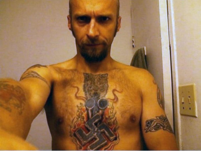One of several photos that white nationalist and neo-Nazi Kevin Goudreau, a Peterborough resident, has posted on his social media accounts in the past showing his swastika tattoo.