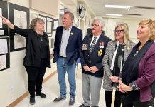 Karen Cooper of the Omemee Legion talks about the Legion's exterior renovation plans with Kawartha Lakes Mayor Andy Letham, Legion President Bill McQuade, Deputy Mayor Tracy Richardson, and Haliburton-Kawartha Lakes-Brock Laurie Scott on April 21, 2022. (Photo: Office of Laurie Scott)