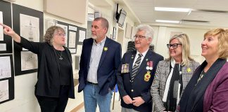 Karen Cooper of the Omemee Legion talks about the Legion's exterior renovation plans with Kawartha Lakes Mayor Andy Letham, Legion President Bill McQuade, Deputy Mayor Tracy Richardson, and Haliburton-Kawartha Lakes-Brock Laurie Scott on April 21, 2022. (Photo: Office of Laurie Scott)