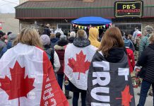 Some of the people who gathered at Peterburgers on April 9, 2022 to support the restaurant, which held s grand reopening after having been closed for four months for defying COVID-19 public health measures. (Photo: Caryma S'ad / @CarymaRules Twitter)