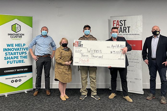 Fleming College students Troy Blackwell and Neil Hamilton, winners of 2022 Pitch It entrepreneurial competition, with judges Sam Ault, Gail Moorhouse, and David Bonn. (Photo courtesy of Innovation Cluster Peterborough and the Kawarthas)