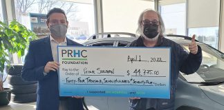 Peterborough Subaru general manager Hernan Lagos (left) presents Peter Sullivan with a ceremonial cheque for $44,775, representing the grand prize jackpot of the PRHC Foundation 50/50 Lottery drawn on April 1, 2022. (Photo courtesy of PRHC Foundation)