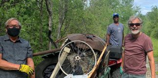 Kawartha Rotarians Gord Fallen, Wesley Letsholo, and Guenther Schubert participating in a clean-up along the Jackson Park trail in 2021. (Photo courtesy of Rotary Club of Peterborough Kawartha)