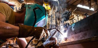 Close-up of a welder at work. (Stock photo)