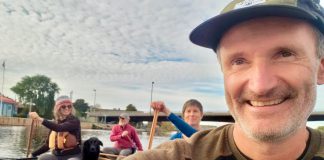 Guest columnist Paul Baines takes a selfie with other paddlers as they approach the mouth of the Trent River at the end of their 150-kilometre journey along the Trent-Severn Waterway. (Photo: Paul Baines)