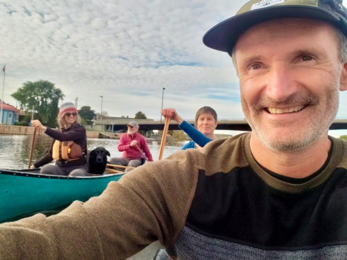 Guest columnist Paul Baines takes a selfie with other paddlers as they approach the mouth of the Trent River at the end of their 150-kilometre journey along the Trent-Severn Waterway. (Photo: Paul Baines)