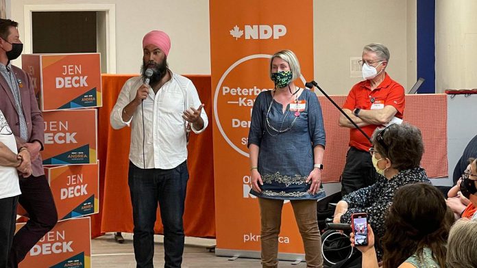 Federal NDP leader Jagmeet Singh stands beside Jen Deck, the Ontario NDP candidate for Peterborough-Kawartha in the June 2nd provincial election, while he addresses supporters at Deck's campaign office in downtown Peterborough on May 10, 2022. (Photo: David Berger)