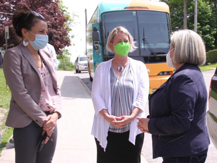 Peterborough-Kawartha NDP candidate Jen Deck (middle) with Peterborough mayor Diane Therrien during a visit by Ontario NDP leader Andrea Horwath (right) on May 25, 2022 to survey some of the damage caused in Peterborough by the May 21 wind storm.  (Photo: Jeannine Taylor / kawarthaNOW)