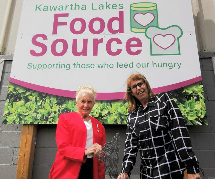 Kawartha Lakes Food Source volunteer Patty Jones (right) receiving the Barbara Truax Volunteer Award from Barbara Truax, one of the not-for-profit charitable organization's longest-serving volunteers. (Supplied photo)