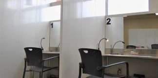 Two of the three consumption booths at the new Consumption and Treatment Services site (CTS), located at the Opioid Response Hub at 220 Simcoe Street in downtown Peterborough. On May 27, 2002, the partner agencies involved in the CTS provided a tour to local media, shortly after Health Canada granted approval of a three-year exemption permiting the supervised use of illegal substances at the site. (Photo: Bruce Head / kawarthaNOW)