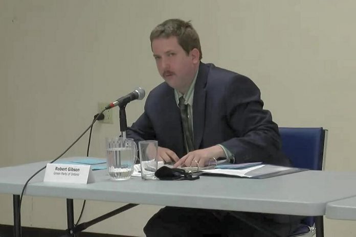 Peterborough-Kawartha Green candidate Robert Gibson speaks during a debate on economic issues hosted by the Peterborough and Kawarthas Chamber of Commerce at the Lakefield Legion on May 10, 2022. (kawarthaNOW screenshot)
