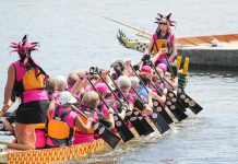 Paddlers at the 2015 Peterborough's Dragon Boat Festival, which returns to Del Crary Park in Peterborough on June 11, 2022 after a two-year absence because of the pandemic, raising funds for breast cancer screening, diagnosis, and treatment at Peterborough Regional Health Centre. (Photo: Linda McIlwain / kawarthaNOW)