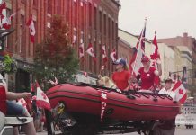 A Canada Day parade in downtown Port Hope prior to the pandemic. (kawarthaNOW screenshot of Municipality of Port Hope video)