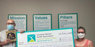 Peterborough writer Erica Richmond (right) with her $530 donation to the Canadian Mental Health Association, Haliburton, Kawartha, Pine Ridge. During May, Richmond announced she would donate half of the proceeds of her children's book 'Pixie and the Bees'. (Photo courtesy of CMHA HKPR)