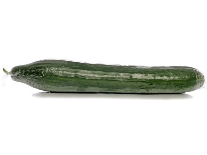 The plastic shrink-wrap on English cucumbers is intended to prevent food waste. Shrink-wrapping cucumbers is an attempt to balance the carbon emissions and waste from that plastic with the methane emissions produced when wasted food is sent to the landfill. (Stock photo)