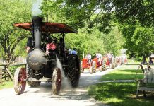 Lang Pioneer Village Museum's Sawyer-Massey traction steam engine leads the tractor parade during a Father's Day Smoke & Steam Show prior to the pandemic. Early steam engines were hauled by draft animals from job to job during the harvest to provide power to large machines such as shingle mills and threshing machines through a belt-and-pulley system. (Photo: Larry Keely)