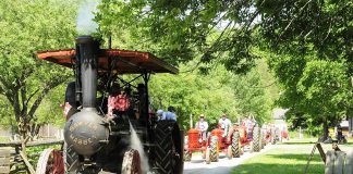 Lang Pioneer Village Museum's Sawyer-Massey traction steam engine leads the tractor parade during the annual Father's Day Smoke & Steam Show. Early steam engines were hauled by draft animals from job to job during the harvest to provide power to large machines such as shingle mills and threshing machines through a belt-and-pulley system. (Photo: Larry Keely)