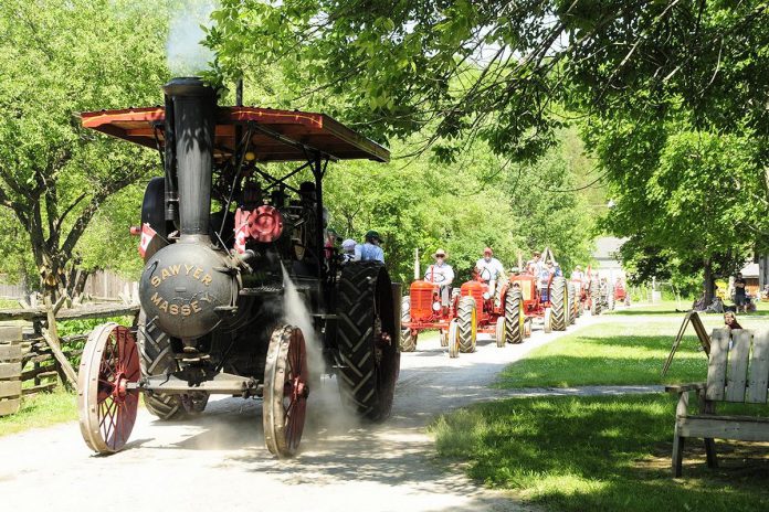 Lang Pioneer Village Museum's Sawyer-Massey traction steam engine leads the tractor parade during the annual Father's Day Smoke & Steam Show. Early steam engines were hauled by draft animals from job to job during the harvest to provide power to large machines such as shingle mills and threshing machines through a belt-and-pulley system. (Photo: Larry Keely)