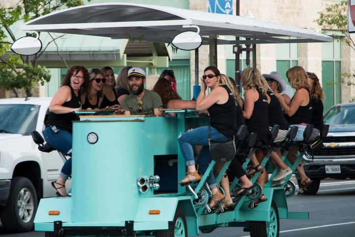 'Captain' Peter Rellinger steers PedalBoro's 15-passenger party bike during the inaugural season of the eco-friendly business he and Hillary Flood launched in 2019. PedalBoro returns for a four-month season in 2022 on Canada Day after a two-year pandemic hiatus. (Photo courtesy of PedalBoro)