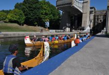 Participants in the Rotary Club of Peterborough Kawartha's 2016 'Adventure in Understanding' canoe trip prepare to take their 26-foot Voyageur canoes through the Peterborough Lift Lock on a 100-kilometre journey to Curve Lake First Nation. (Photo: Rotary Club of Peterborough Kawartha)