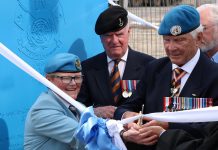 Honorary Lieutenant Colonel Lee-Anne Quinn and Major-General (retired) Lewis Mackenzie cut the ribbon for the UN Peacekeepers Monument in Peterborough's new urban park on July 1, 2022. (Photo courtesy of Sean Bruce)