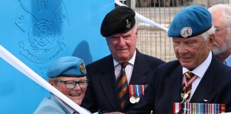 Honorary Lieutenant Colonel Lee-Anne Quinn and Major-General (retired) Lewis Mackenzie cut the ribbon for the UN Peacekeepers Monument in Peterborough's new urban park on July 1, 2022. (Photo courtesy of Sean Bruce)