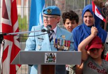 Honorary Lieutenant Colonel Lee-Anne Quinn, president of the Frank Poley (Peterborough) chapter of the Canadian Association of Veterans in United Nations Peacekeeping, speaks at the ribbon-cutting ceremony of the UN Peacekeepers Monument in Peterborough's new urban park on July 1, 2022. (Photo courtesy of Sean Bruce)