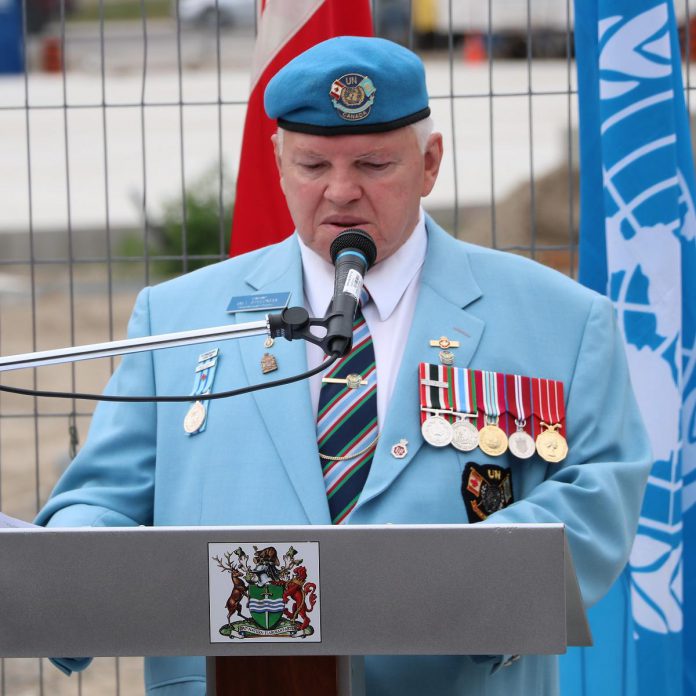 Bill Steedman, a member of the Peterborough chapter of the Canadian Association of Veterans in UN Peacekeeping, speaks at the ribbon-cutting ceremony of the UN Peacekeepers Monument in Peterborough's new urban park on July 1, 2022. (Photo courtesy of Sean Bruce)