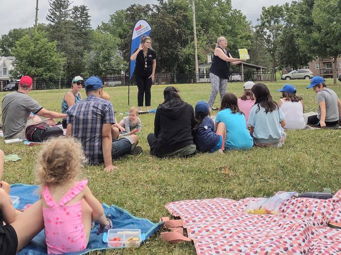 Peterborough Public Library staff host Storytime in the Park at Roger's Cove in Peterborough. Self-directed learning is a powerful way for people of all ages to build resiliency and adapt to the reality of our changing climate.   (Photo courtesy of Peterborough Public Library)