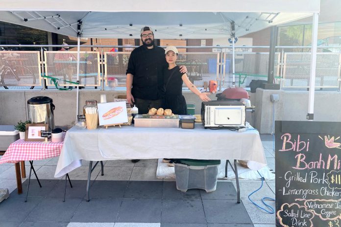 Connor McCracken and Aurora Nguyen serve their home-style Vietnamese banh mi every Saturday morning at the farmers' market in downtown Peterborough. (Photo: Bibi Banh Mi)