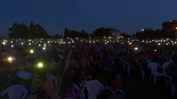 Phones light up Del Crary Park as far as the eye can see during The Strumbellas concert at Peterborough Musicfest on August 10, 2022. (Photo: Bruce Head / kawarthaNOW)