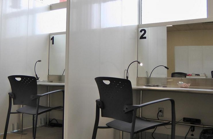 Two of the three consumption booths at the Consumption and Treatment Services (CTS) site located at the Opioid Response Hub at 220 Simcoe Street in downtown Peterborough. With medical assistance available on site, substance users at the CTS are monitored in case they suffer an adverse reaction when using. (Photo: Bruce Head / kawarthaNOW)